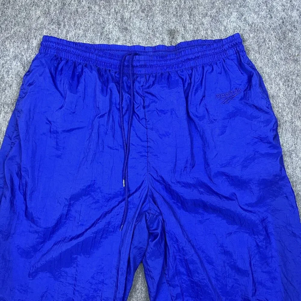 Vtg Reebok Men's Track Pants Blue Nylon Elastic Waist Zip Ankle 90's Size Medium